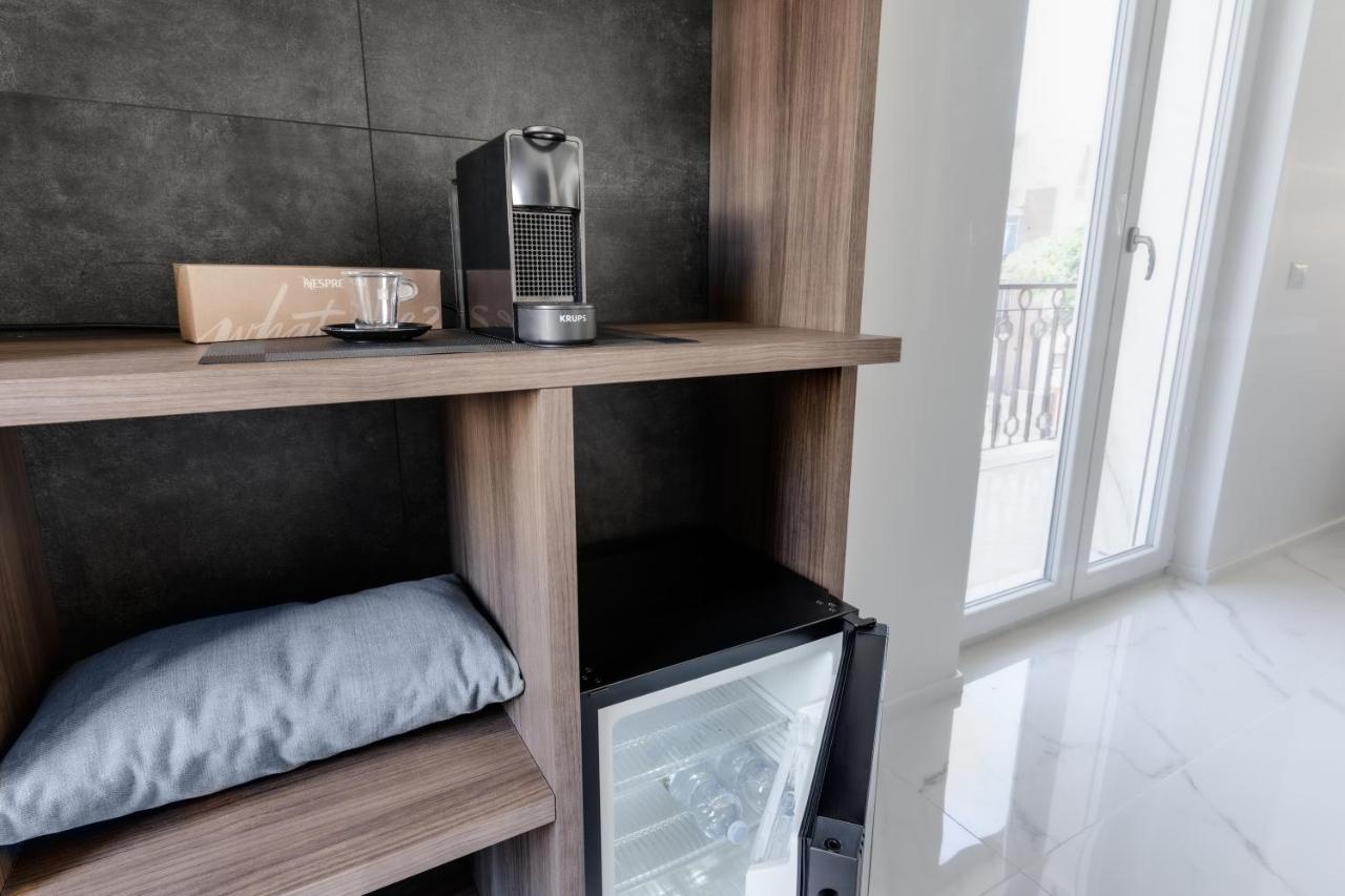 Caralis Suites Rooms 2