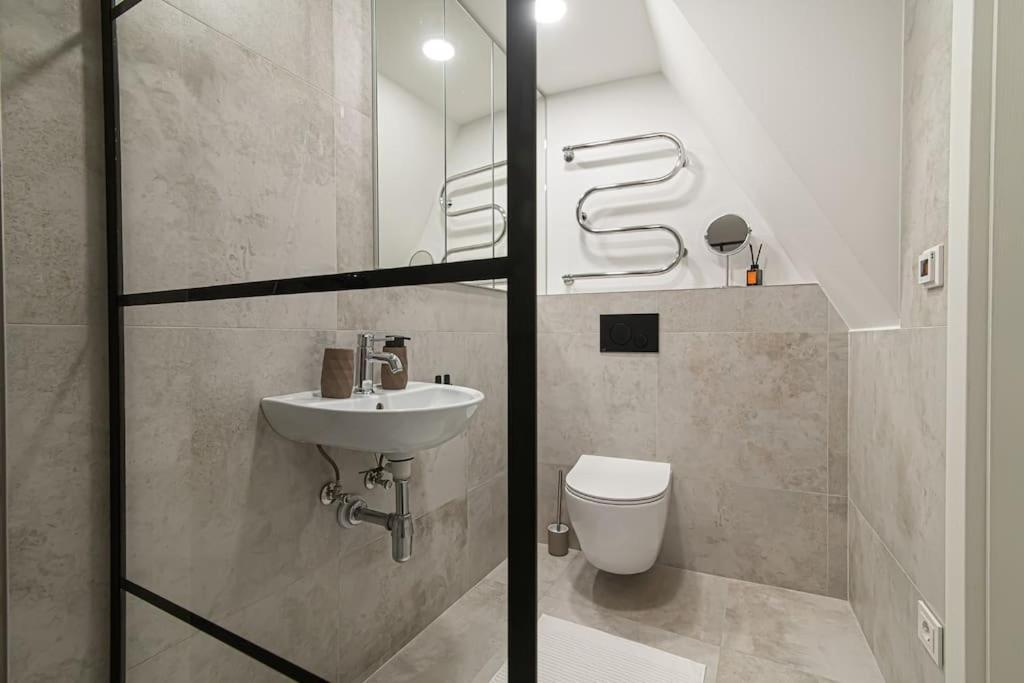 Modern Apartment in the Heart of Vilnius Old Town with Free Parking by Urban Rent