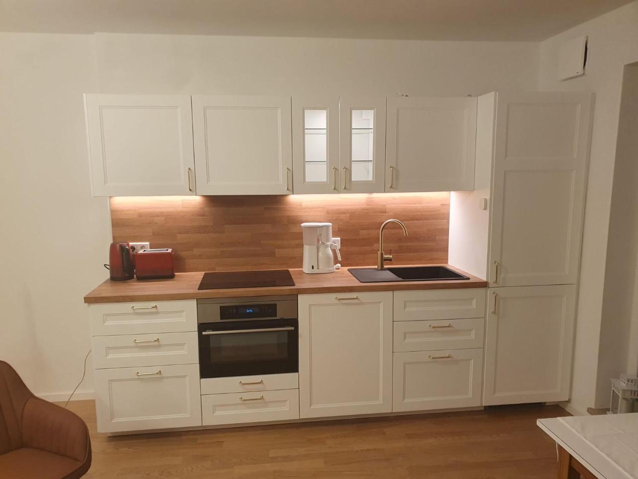 75m2 Lichtdurchflutete 3 Zimmer Souterrain Wohnung in Einem Neubau Villa 1